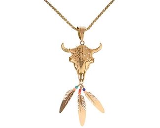 Ray Tracey Navajo 14K Gold Bull Skull Necklace
From award winning Navajo jeweler Ray Tracey, a custom made 14K gold large skull accented with diamonds, drop feathers, coral and lapiz, 14K gold heavy gold box chain. 