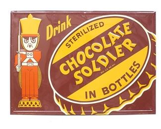 Chocolate Soldier Embossed Tin Advertising Sign Single-sided rolled edge advertising sign in tin with embossed graphics of bottle cap and soldier, circa 1960s
19.5"h x 27"w