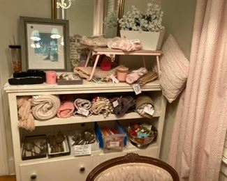 Placements, silverware, bed tray, pillow, candles.