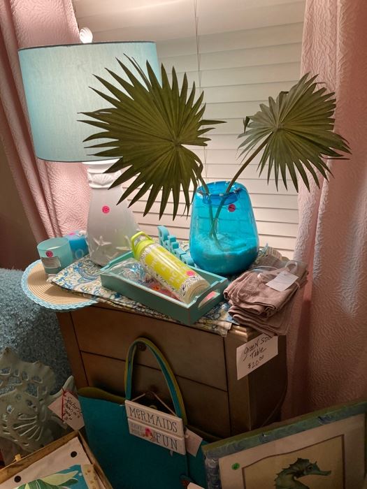 Beach-themed placemats, tray, candles, napkins, throw