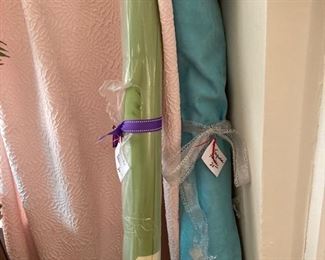 Fabric bolts, one is 5' of aqua suede, the other is 5' of Ballard outdoor olive green