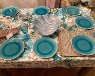 Lovely shell salad bowl or centerpiece 
8 aqua plates 
4 place mats 
3 yards of fabric to match
