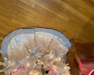 Looking down at silvery tree skirt
