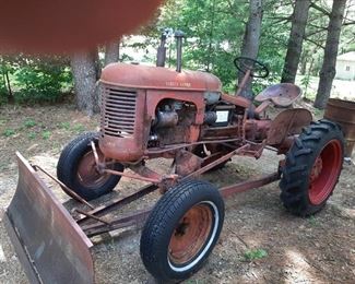 The forerunner to Massey-Ferguson!  This unique, antique tractor has original snowplow attached.  It runs well.  New battery. 1951.  This is a MasseyHarris Pony.
