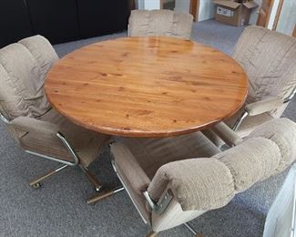 Handmade table with 4 comfy chairs on wheels!