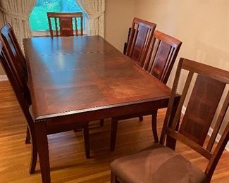 dining table with extra leaf and pads, excellent condition, 6 chairs 