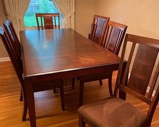 dining table with extra leaf and pads, excellent condition, 6 chairs 