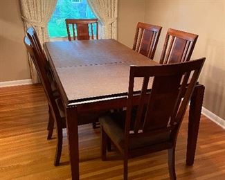 dining table with extra leaf and pads, excellent condition, 6 chairs 