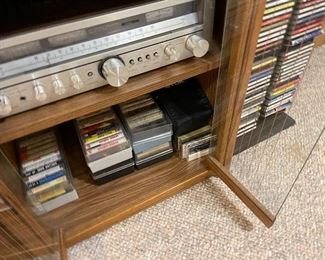 vintage stereo equipment, cassette tapes, CDs