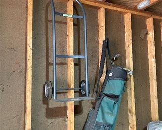 Golf clubs with bag, dolly 