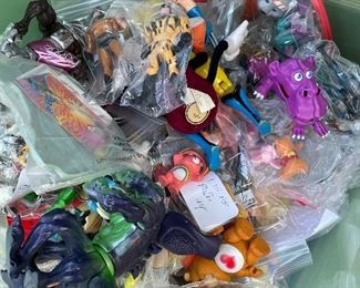 Many vintage toys and action figures, Batman, DC, Marvel, glow worms, get along gang, smurfs, California raisins, pee wee Herman, micro machines, hot wheels, charmkins and more 