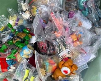 Many vintage toys and action figures, Batman, DC, Marvel, glow worms, get along gang, smurfs, California raisins, pee wee Herman, micro machines, hot wheels, charmkins and more 