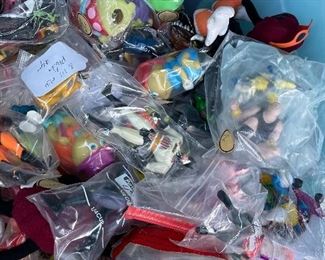 Many vintage toys and action figures, Batman, DC, Marvel, glow worms, get along gang, smurfs, California raisins, pee wee Herman, micro machines, hot wheels, charmkins and more 