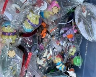Many vintage toys and action figures, Batman, DC, Marvel, glow worms, get along gang, smurfs, California raisins, pee wee Herman, micro machines, hot wheels, charmkins and more 