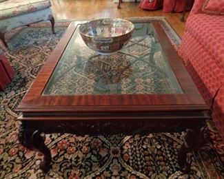 Carved glass top coffee table