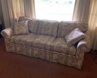 sofa with brown cover