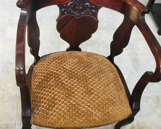 Armchair with upholstered seat