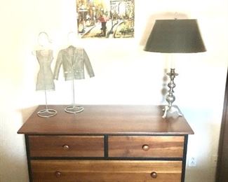Four drawer dresser with black trim