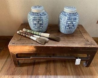 Asian altar table and ginger jars