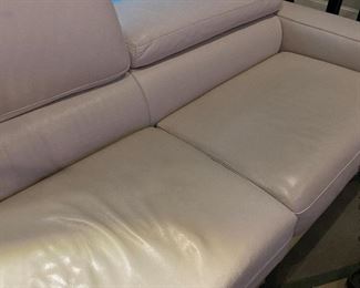 detail of seat cushions of leather sofa