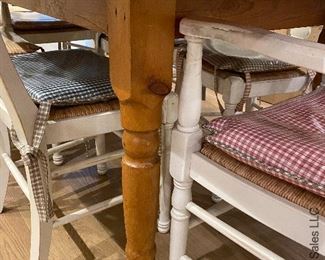 detail of farmhouse table and chairs