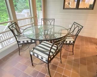 Brown Jordan outdoor furniture. Two chairs will be sold with the side table as shown; the round table will be sold as a set with four chairs.