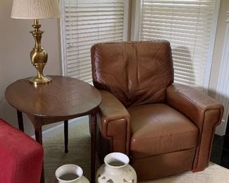 Leather chair, vases, table