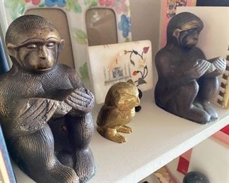 Vintage brass owl from Canada and monkey bookends from India