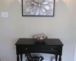 BLACK SIDE TABLE AND ARTWORK