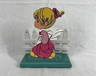 Girl in apron and white picket fence napkin holder