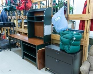 Desk, chests, etc. Camping too - sleeping bag on right!