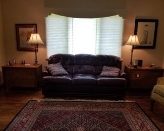 Pair of Baker end tables, paor of stick lamps and leather sofa