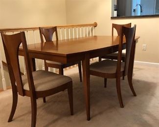 Mid-Century Modern Walnut Jordan Marsh Dining Table & 5 Chairs with 2 additional leaves: Table - 29Hx66Wx42D, Chairs - 37Hx20Wx19D, 2 Leaves each 42Dx18W