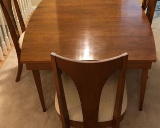 Mid-Century Modern Walnut Jordan Marsh Dining Table & 5 Chairs with 2 additional leaves: Table - 29Hx66Wx42D, Chairs - 37Hx20Wx19D, 2 Leaves each 42Dx18W