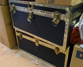 Two blue metal footlockers