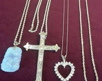 14k gold, lavender natural undyed jade, diamond heart.  Cross is sterling with 18k gold tips. Chains are 14k gold