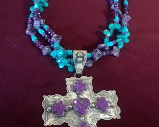 Dyed turquoise and amethyst color stones, .925 silver.  Signed ROCKI and R  Cook