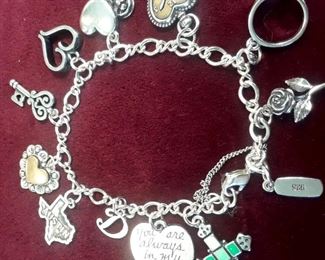 Sterling silver charm bracelet. All charms are James Avery as is the chain.