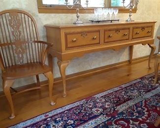 Oak sideboard, and one of the host chairs.