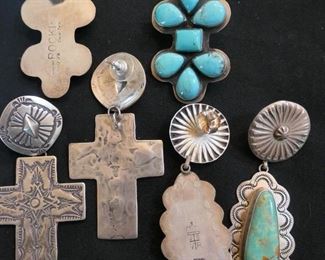 Navajo turquoise and silver jewelry. Signed. Shown is the front and reverse of each pair.