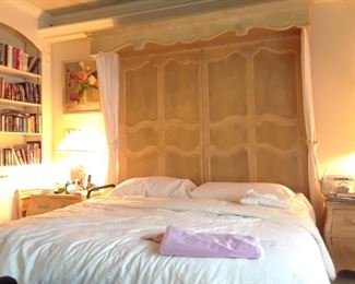 Dramatic king size headboard by Henredon. Tables are by Henredon.