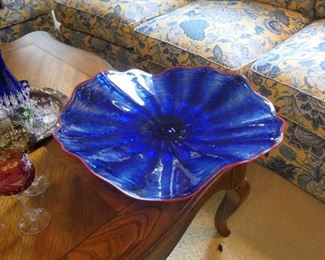 Very large art glass bowl. No signature noted. Pink edge is suggestive of Chihuly. We hope someone recognizes the maker of this dramatic piece. An Austin artisan?