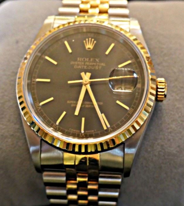 Men's Rolex Oyster Perpetual Datejust stainless 16233. U972571. Price will depend on whether the engraving on the back can be removed. Stay tuned. Please do not phone, email or text. I will not answer. 