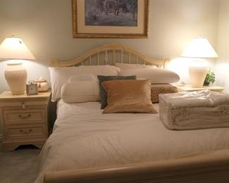 Queen bed. One of several G. Harvey prints.