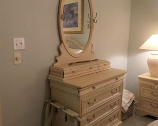 White washed dresser and night stands.