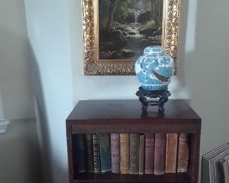 Oil on canvas of a waterfall is not available. Small bookcase, new blue and white ginger jar.