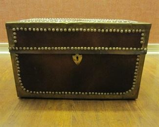 Brass studded leather chest