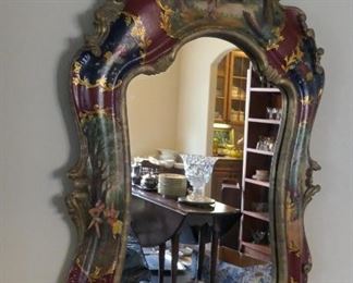 Italian mirror purchased in Venice, painted decoration. Gilt and scenic cartouches.