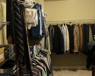 View of men's closet. Mostly M-L sizes. Many Neiman Marcus labels.