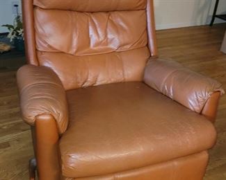 $125.00, Butterscotch leather recliner has slight wear as shown in picture